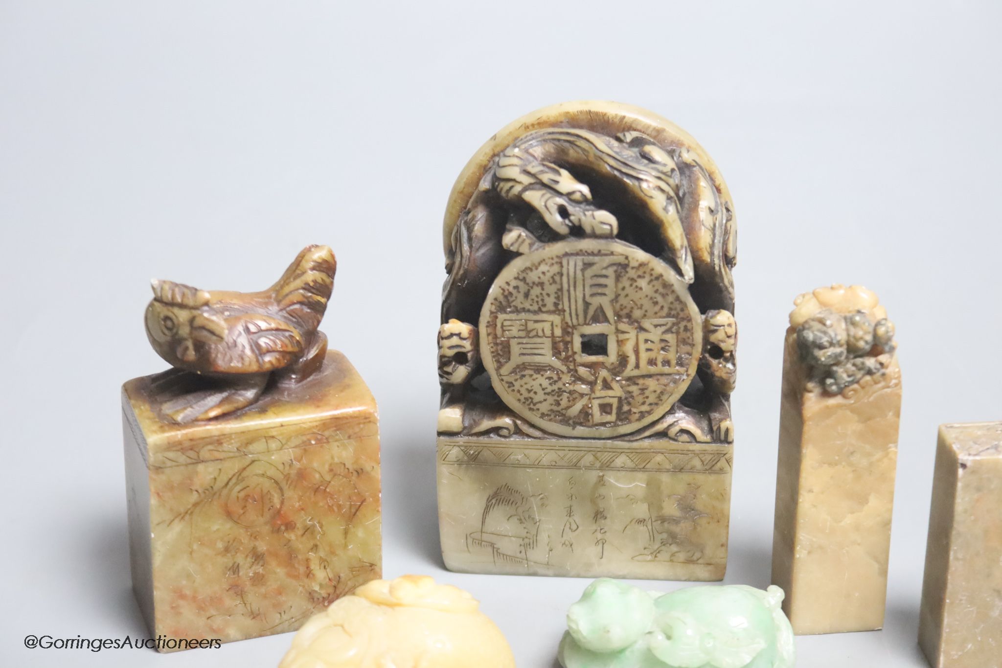 Six various Chinese jadeite and soapstone carvings, tallest 12cm